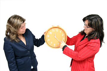 Image showing sexy businesswoman with clock, business photo