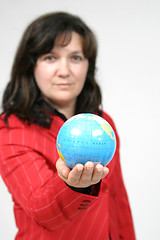 Image showing young pretty woman with Earth