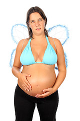 Image showing Beautiful pregnant girl with innocent angel wings