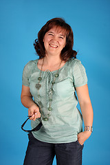 Image showing fashion woman on blue background studio shot