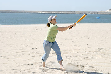 Image showing playing baseball on the beach, sports photo