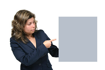 Image showing Young woman holding blank board