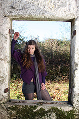 Image showing  beautiful woman in an autumn park 