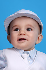 Image showing Portrait of a happy baby boy Isolated on blue background