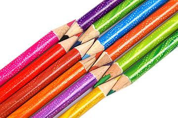 Image showing Assortment of coloured pencils with shadow on white background