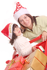 Image showing mother and daughter and the shopping cart