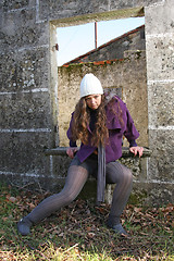 Image showing  beautiful woman in an autumn park 