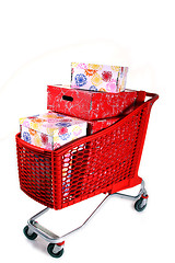 Image showing Shopping cart with lots of presents isolated on white background