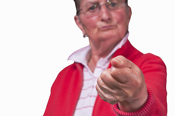 Image showing angry grandmother clenchs fist