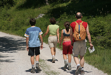 Image showing Family walking mountain path