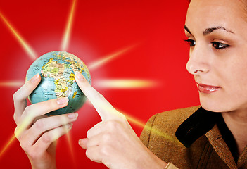 Image showing Globe in a girl's hands