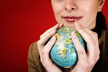 Image showing Globe in a girl's hands