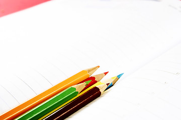 Image showing Color pencil and agenda