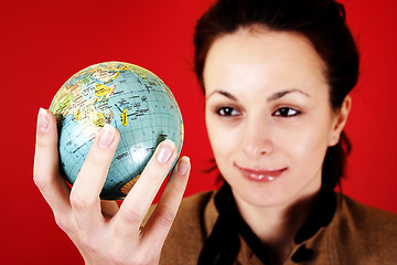 Image showing Globe in a girl's hands