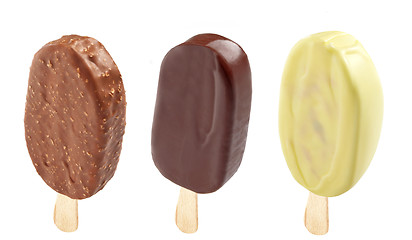 Image showing three different Ice creams covered with chocolate