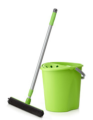 Image showing green bucket and mop