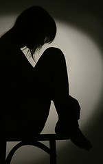 Image showing silhouette of sitting woman