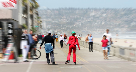 Image showing Couple rollerblading