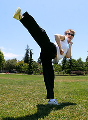 Image showing Girl exercising outdoors