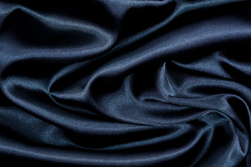 Image showing Smooth elegant black silk as background 