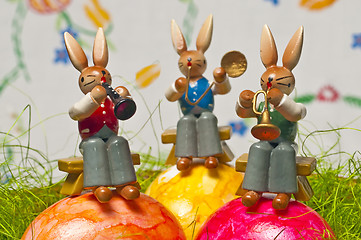 Image showing easter rabbit plays music