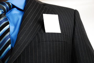 Image showing Business man with business card in the pocket