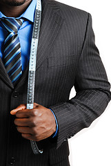 Image showing Business man with tape measure