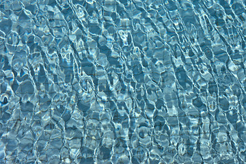 Image showing beautiful clear pool water reflecting in the sun
