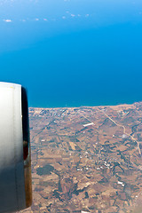 Image showing View through airplane porthole