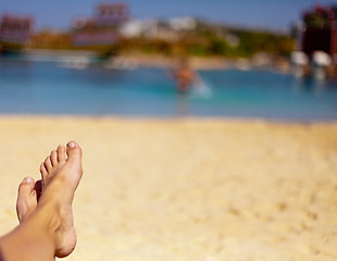 Image showing sandy feet on the beach