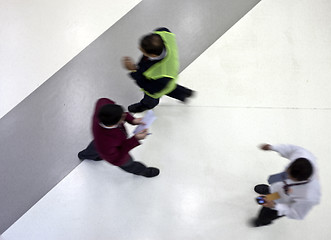 Image showing Moving people from above at the airport