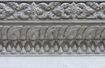 Image showing White stucco , thai style on the Wall