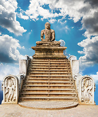 Image showing statue of a meditating Buddha against the sky. A collage of many
