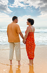 Image showing couple on the beach at sunset