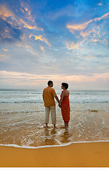 Image showing couple on the beach at sunset