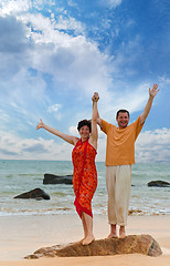 Image showing couple on the beach at sunset