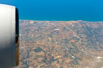 Image showing View through airplane porthole