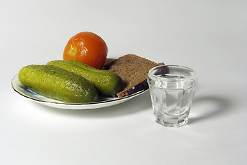 Image showing Plate with cucumbers and tomato
