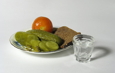 Image showing Plate with cucumbers and tomato