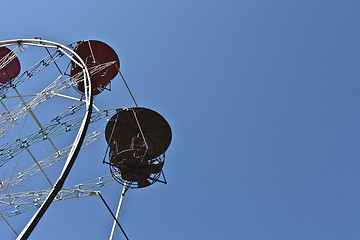 Image showing ferris wheel against a blue sky