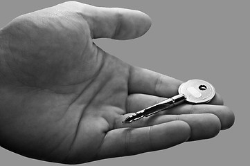 Image showing Man holding key in his hand