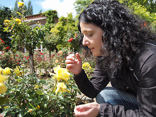 Image showing Pretty brunette sneezing coughing