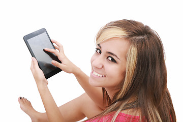 Image showing Overhead photograph of a beautiful young women sitting on floor 