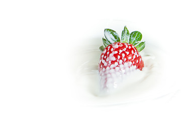 Image showing strawberry splashing into milk