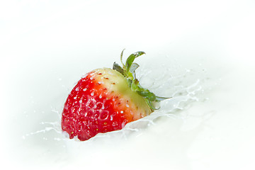 Image showing strawberry splashing into milk