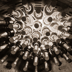 Image showing wine bottles stacked up