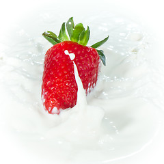 Image showing strawberry splashing into milk