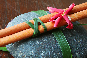 Image showing Chopsticks and Flower