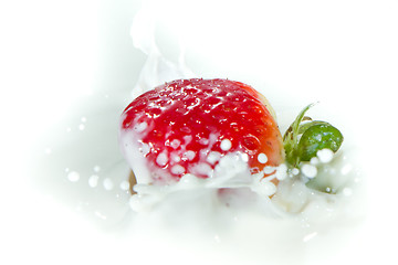 Image showing strawberry splashing into milk