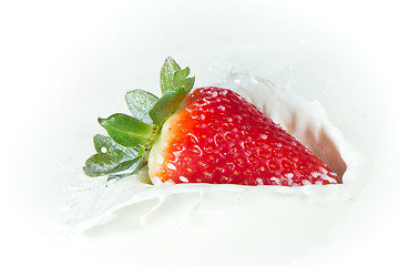 Image showing strawberry splashing into milk